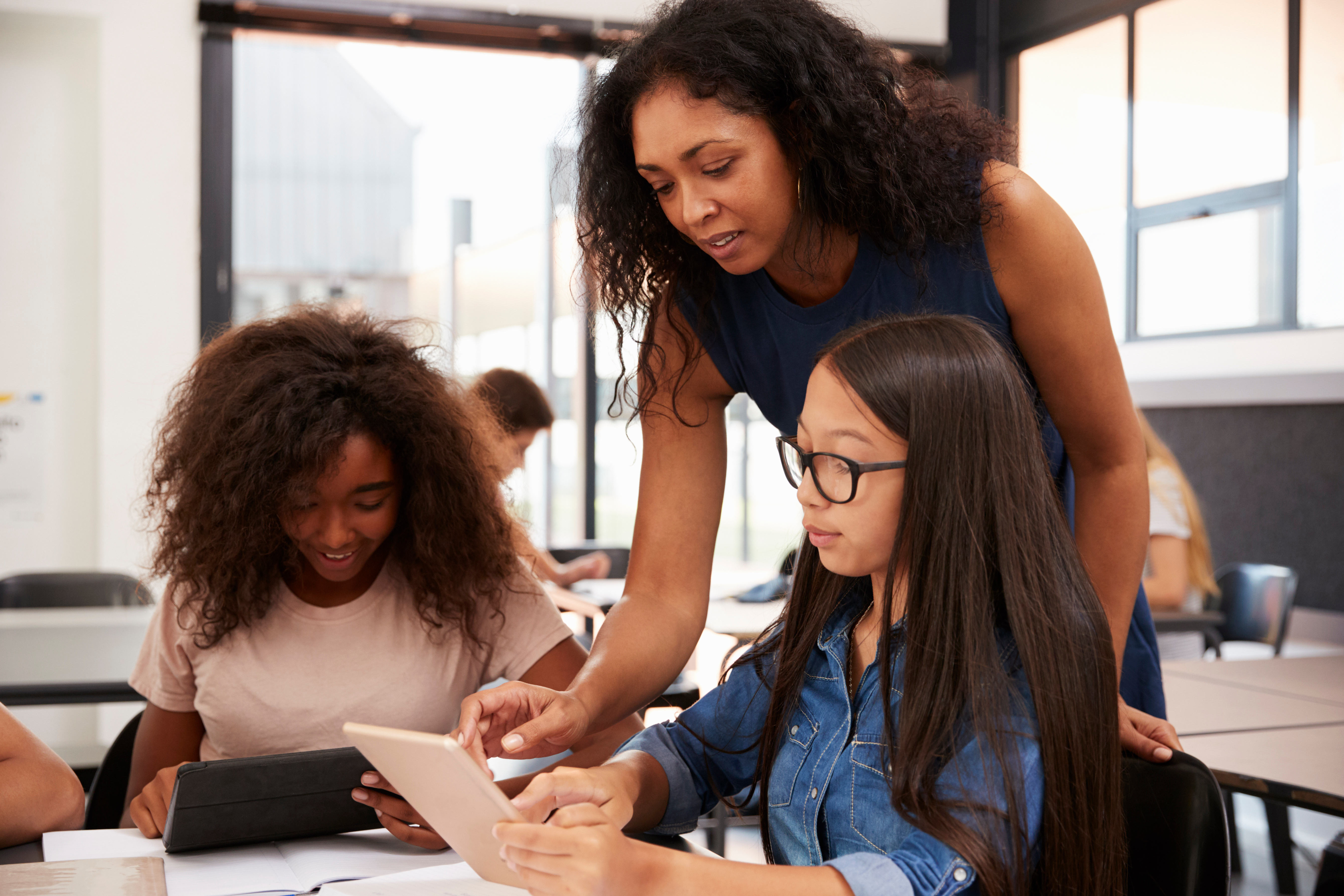 High school teacher with students