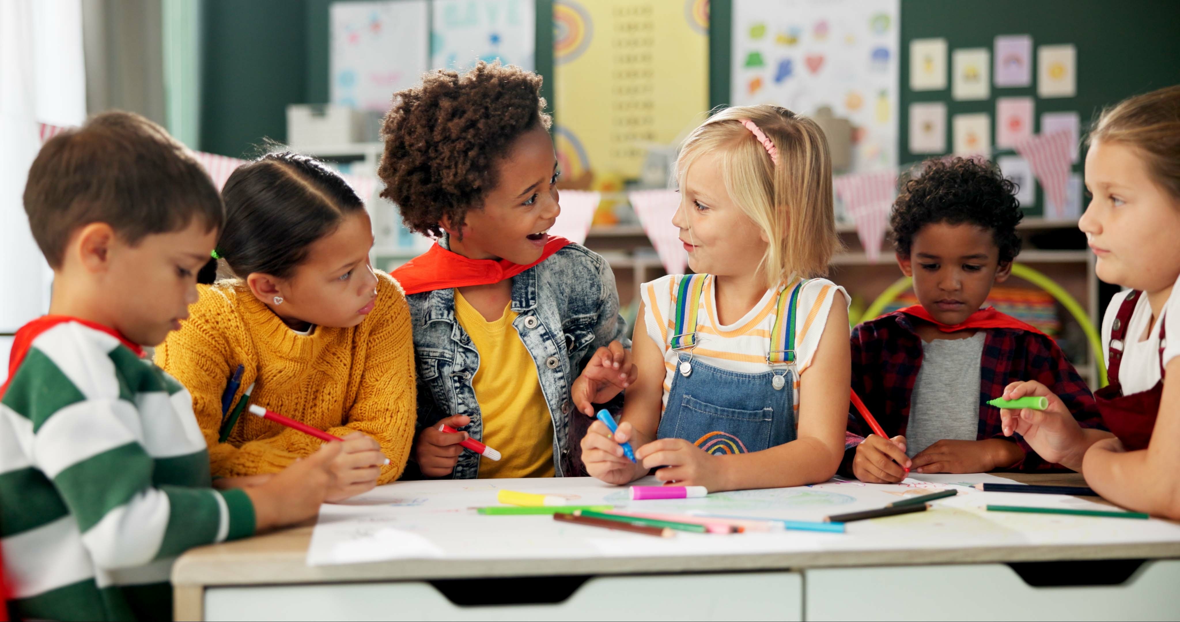 Teacher helping child